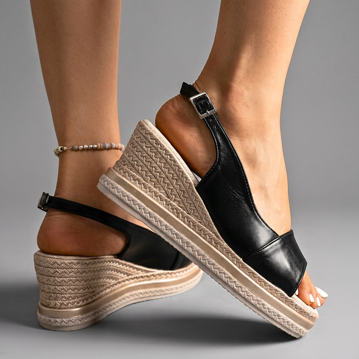 LIVIANA WEDGE SANDALS" could be rephrased as "LIVIANA ELEVATED WEDGE SANDALS.