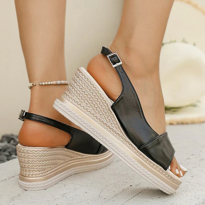 LIVIANA WEDGE SANDALS" could be rephrased as "LIVIANA ELEVATED WEDGE SANDALS.