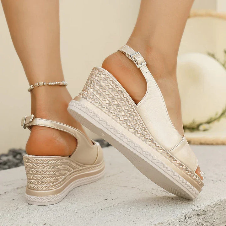LIVIANA WEDGE SANDALS" could be rephrased as "LIVIANA ELEVATED WEDGE SANDALS.