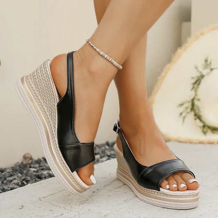 LIVIANA WEDGE SANDALS" could be rephrased as "LIVIANA ELEVATED WEDGE SANDALS.